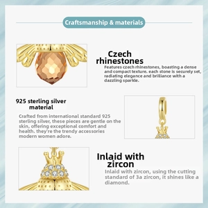 Detailed macro of S925 silver bee pendant featuring Czech rhinestones and 3A zircon stones