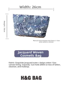 Detail view of jacquard blue paisley makeup bag with dimensions and material specifications