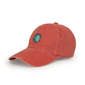Close-up of red washed cotton baseball cap featuring detailed earth pattern embroidery