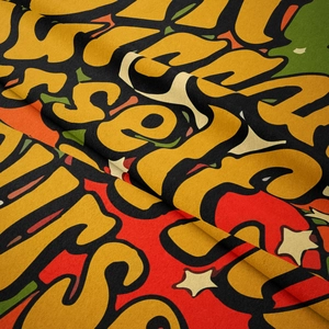 Close-up of woven bohemian tapestry showing colorful star patterns and fabric texture