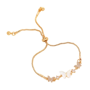 Adjustable gold butterfly charm bracelet with sparkling crystals and mother of pearl inlay