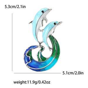 Fashionable enamel dolphin brooch in blue and green with dimensions 5.3cm by 5.1cm