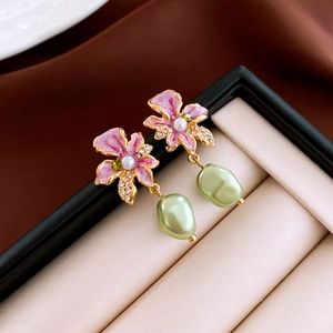 Vintage enamel flower earrings with green baroque pearls and crystal accents