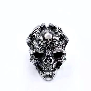 Gothic punk skull ring for men with vintage silver finish and detailed carved skeletons