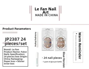 Detail view of 24pcs minimalist green french false nails with glue in retail packaging
