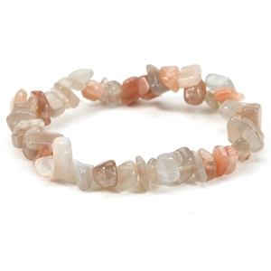 Macro view of multi-color irregular natural stone beads on an elastic stretch bracelet