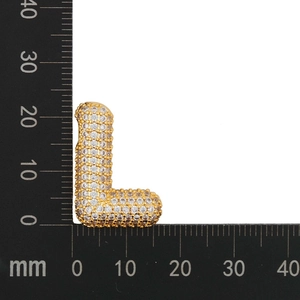 Size measurement of the 26mm gold letter L zircon balloon pendant with a ruler
