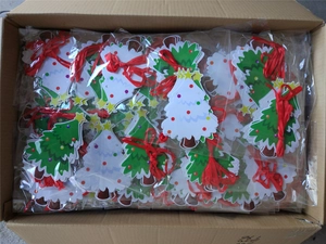 Bulk pack of green and white Christmas tree shaped paper hanging decorations in a box
