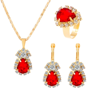 Elegant gold-tone jewelry set with pear-shaped red gemstones and clear crystals