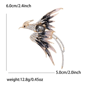 Detail view of phoenix brooch with dimensions 6.0cm x 5.0cm and weight 12.8g