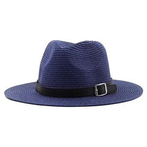 Dark blue straw panama hat with black leather buckle strap for summer beach sun protection