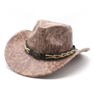 Chapeau de cowboy vintage en daim marron avec emblème de buffle et larges bords