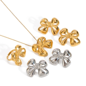 18k gold plated stainless steel bow jewelry set with necklace, ring, and earrings
