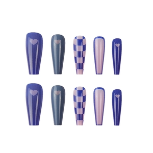 Klein blue checkerboard press-on nails set in coffin shape with heart pattern