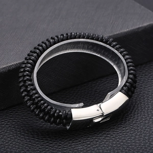 Men's braided black leather bracelet with silver stainless steel spring clasp closure