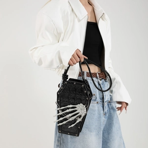 Gothic coffin-shaped handbag in black PU leather with skull texture and white bone handle