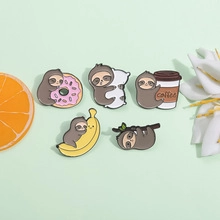 Set of five cute cartoon sloth enamel pins featuring coffee, donuts and bananas