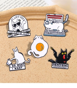 Detailed set of 5 cute cartoon cat enamel pins in black and white styles on cork background