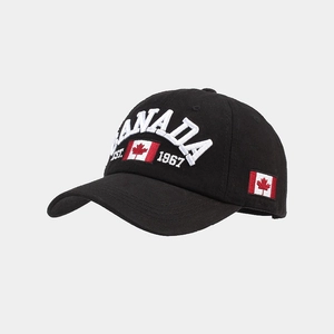 Detailed white Canada flag and EST. 1967 embroidery on a black cotton baseball cap