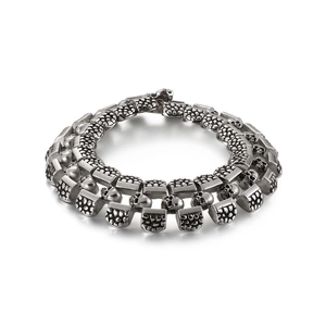 Gothic punk skull bracelet in retro silver finish with modular textured links for men
