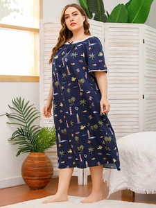 Detail of plus size sleepshirt featuring nautical prints and delicate lace trim on neckline