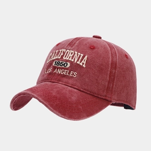 Close-up of vintage embroidered California letters on washed cotton baseball cap