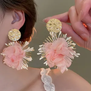 Artistic pink silk flower earrings with golden hammered metal studs for women