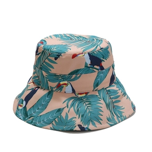 Pink tropical bucket hat with palm leaves and toucan print for summer sun protection