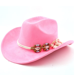 Detailed view of pink cowboy hat with decorative shells, wooden beads and woven band