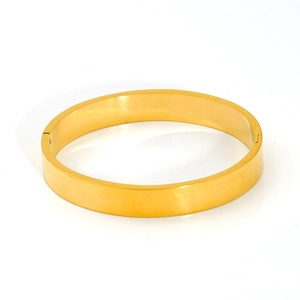 Polished 18K gold plated stainless steel bangle bracelet with a minimalist round design