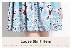 Detail of light blue floral dress with loose pleated hem and delicate button accents