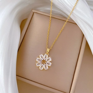 Élégant collier en titane doré avec pendentif fleur rotative en zircon sur soie