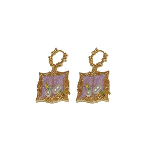 Vintage gold frame earrings with purple enamel, white pearls and green leaf details