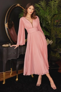 Close-up of pink pleated dress featuring a deep V-neckline and elegant chiffon texture