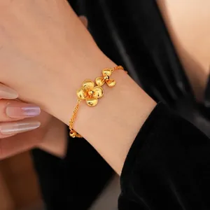 Vintage style gold-plated flower bracelet featuring a brushed metal finish for women