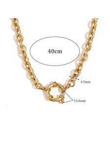 Detail view of gold stainless steel necklace with size markings: 40cm length and 4.5mm width