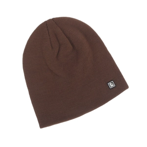 Close-up of the fine texture and square RN label on a dark brown knit beanie hat