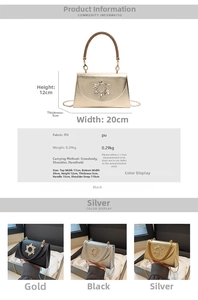 Close-up of small square evening bag with sunburst rhinestone buckle and metallic chain