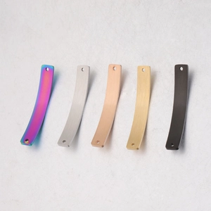 Close-up of curved rectangular metal bar connectors in five different polished finishes
