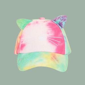 Detailed view of colorful tie-dye patterns and 3D cat ears on child's baseball cap