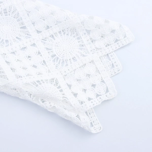Elegant white hollow out lace polo shirt with long sleeves and geometric floral patterns