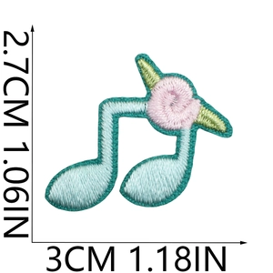 Macro detail of music note floral embroidery patch with 3x2.7cm size dimensions