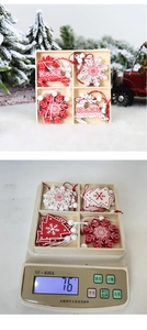 Detailed view of painted wooden Christmas ornaments featuring elk and snowflake designs