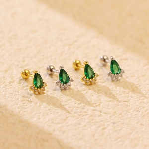 Elegant emerald green teardrop earrings in gold and silver finish with zircon details