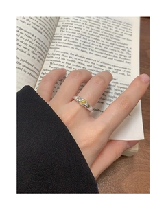 Detailed view of an S925 silver ring featuring three geometric yellow zircon stones