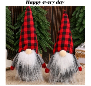 Detail of red and black plaid Christmas gnomes with long white beards on festive background