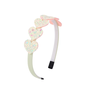 Detail of glitter heart headband for girls with sparkly stars and non-slip ends