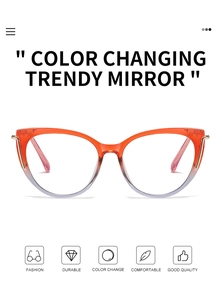 Close-up of cat-eye frames with orange to purple gradient and metallic hinges