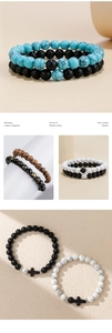Detailed close-up of beaded couple bracelets with magnetic charms and cross pendants