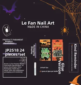 Detail of Halloween press-on nail kit JP2518 featuring bat and pumpkin art with glue
